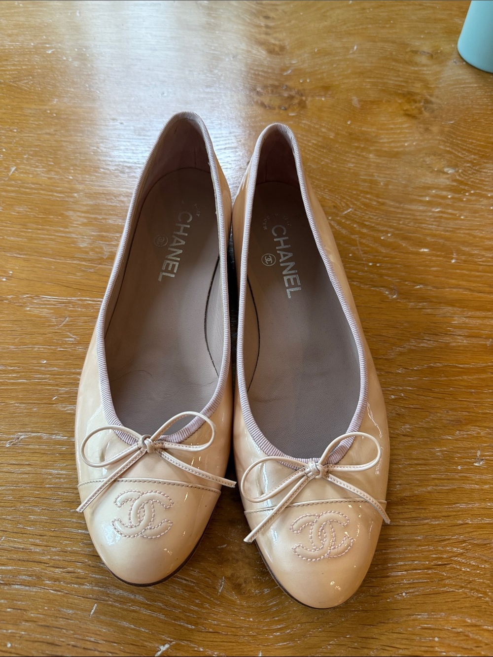 CHANEL Beige Patent Leather Ballet Flats with Bow